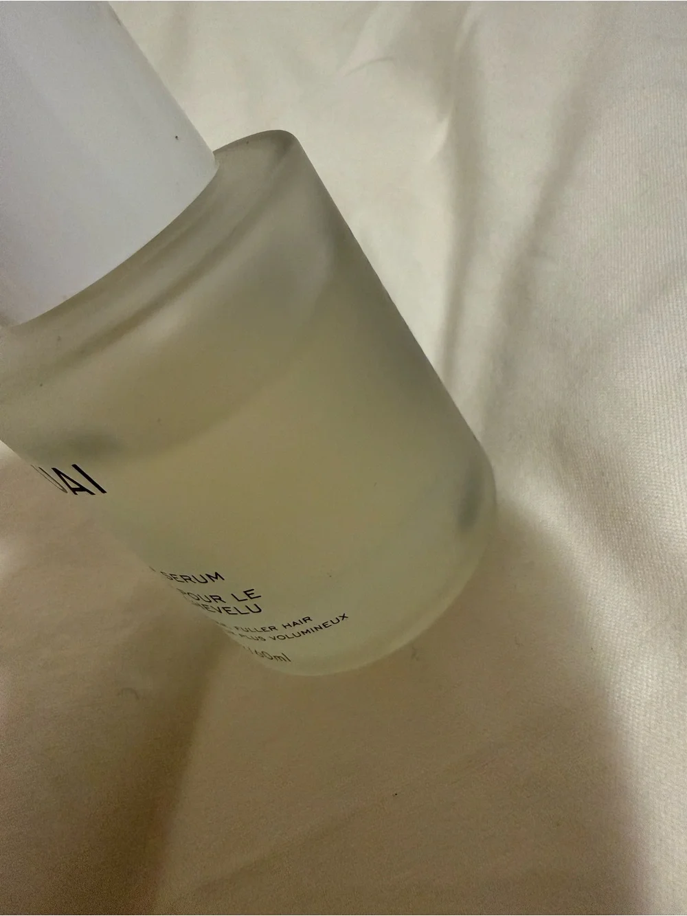 OUAI White Serum Bottle with Frosted Glass and White Cap